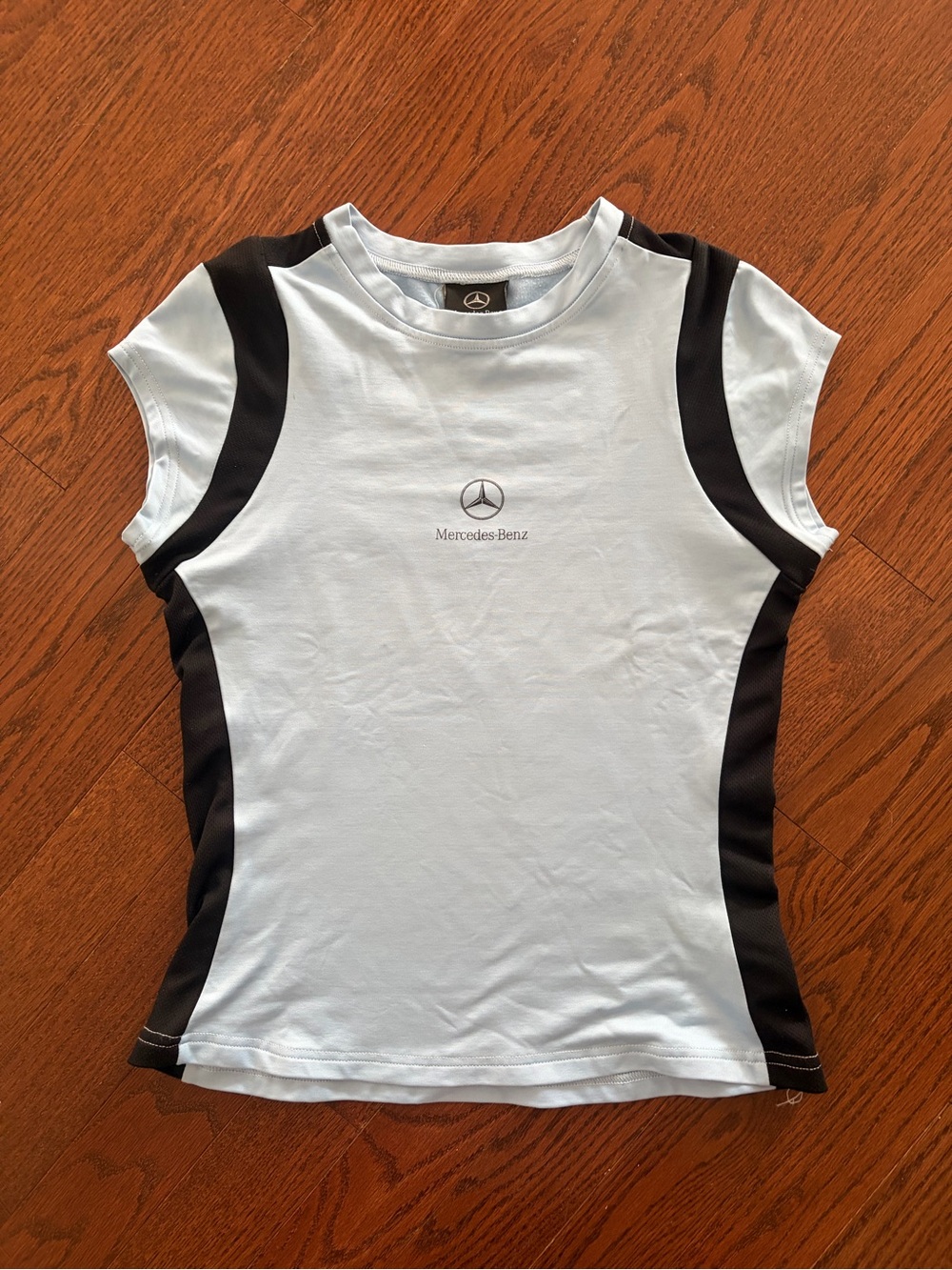 Mercedes-Benz Women’s Light Blue Short Sleeve Performance Tee with Black Panels